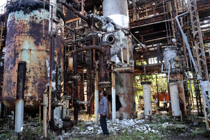 gas disaster India ut-of-court settlement