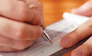 Man_writing_cheque