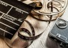 Vintage_film_reel,_camera_and_director_board