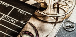 Vintage_film_reel,_camera_and_director_board